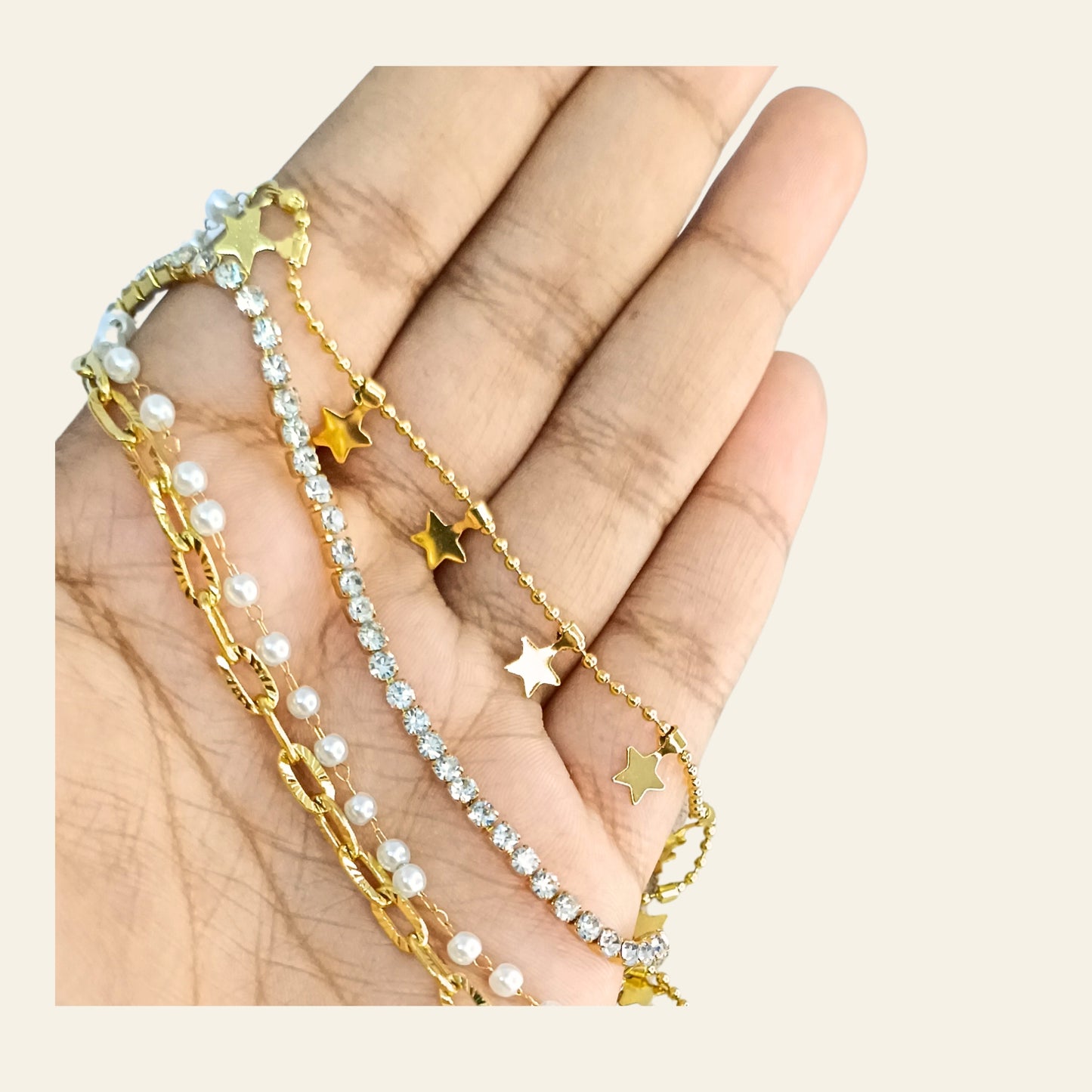 Golden Multi-Layered Bracelet with Stars, Pearls & Rhinestones