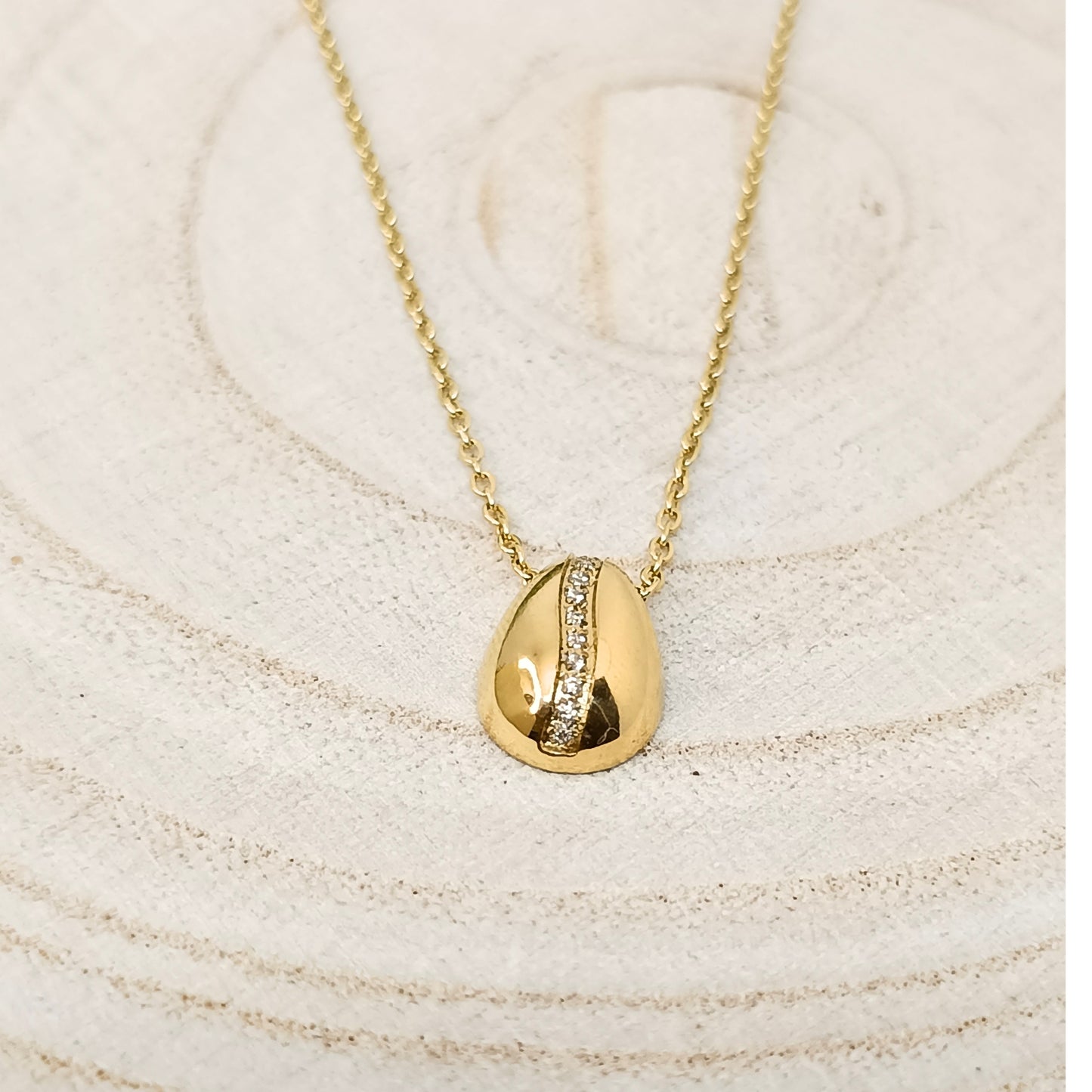 Golden Cowrie Shell Pendant Necklace with Stone Detailing