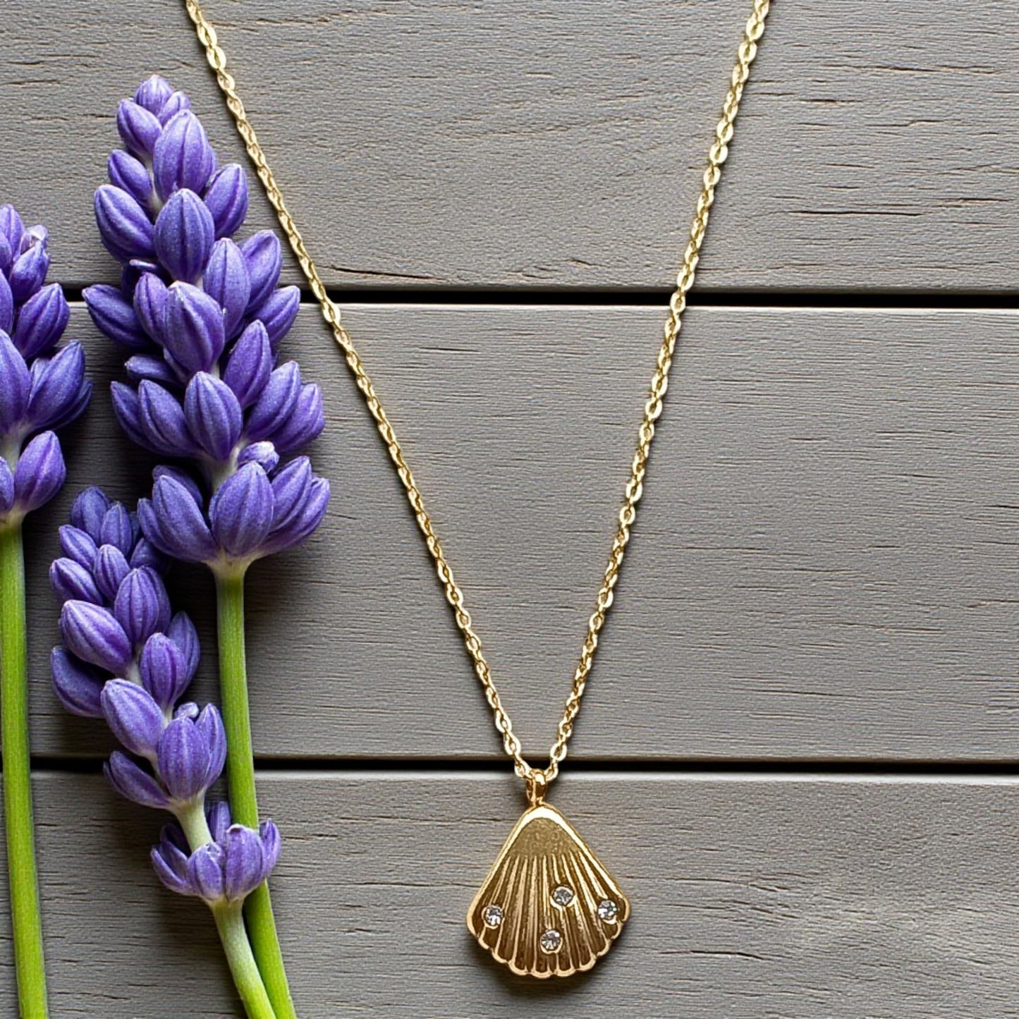 Golden Seashell Pendant Necklace with Stone Accents