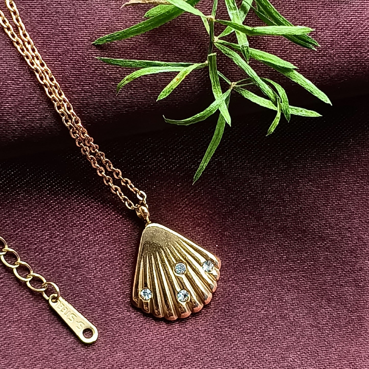 Golden Seashell Pendant Necklace with Stone Accents
