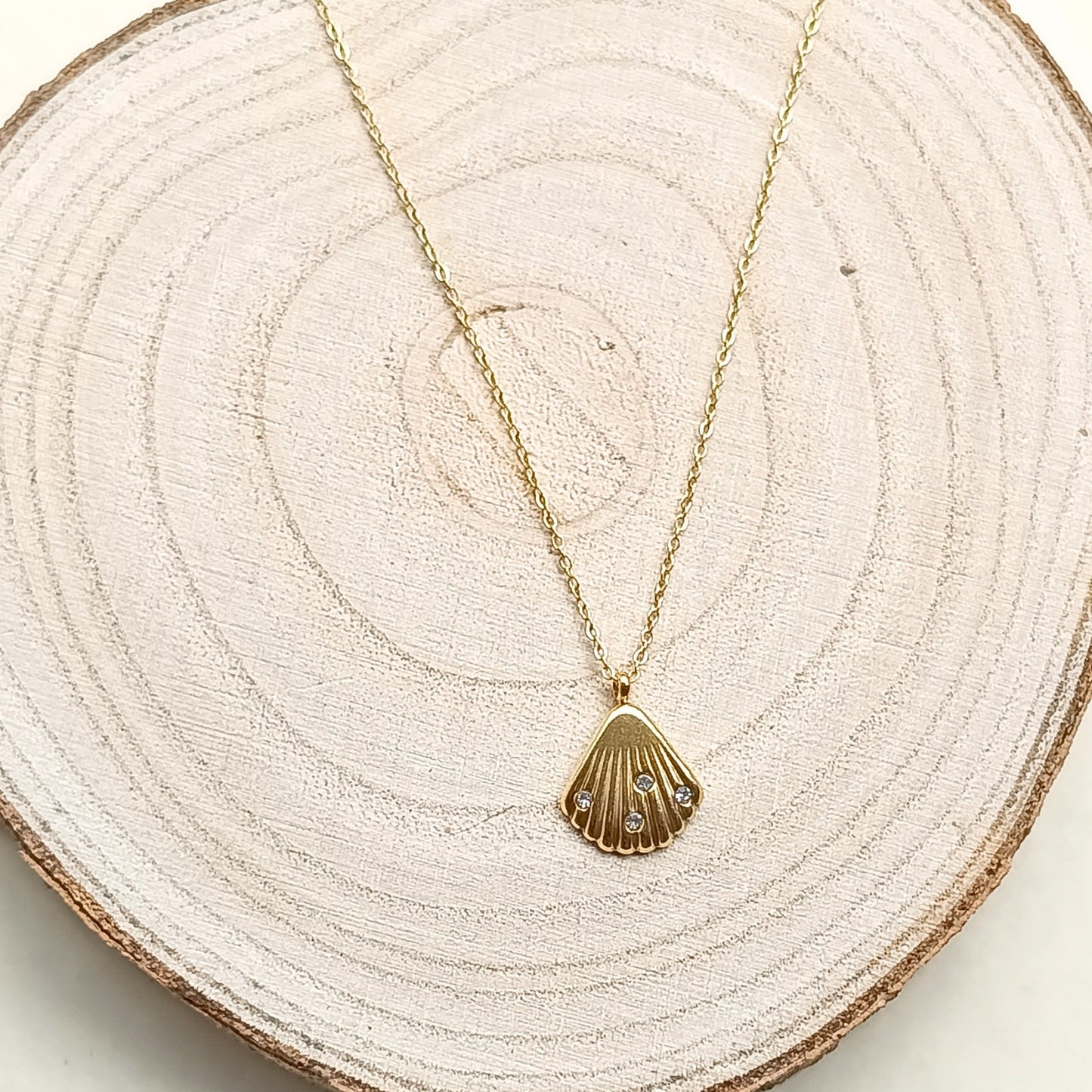 Golden Seashell Pendant Necklace with Stone Accents